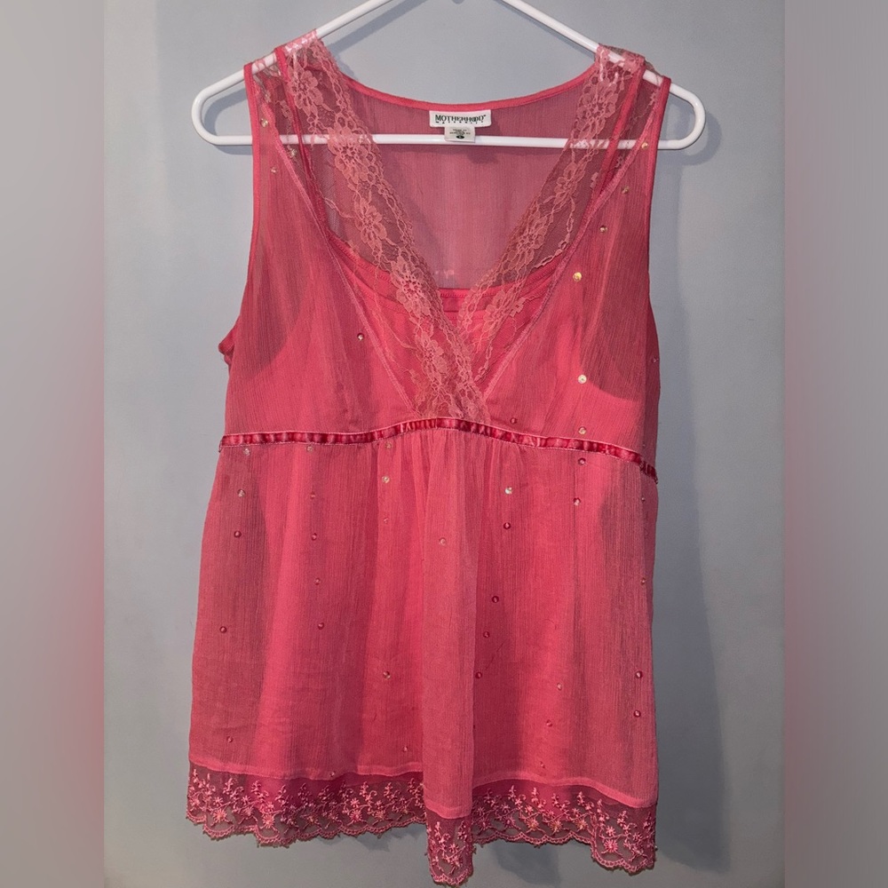 Y2K reminiscent, pink maternity top.